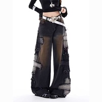 Pantalon en jean déchiré coupe large style rock punk pour femme, nouveau design tendance, taille haute, ample et fluide, jambe droite, longueur ras du sol