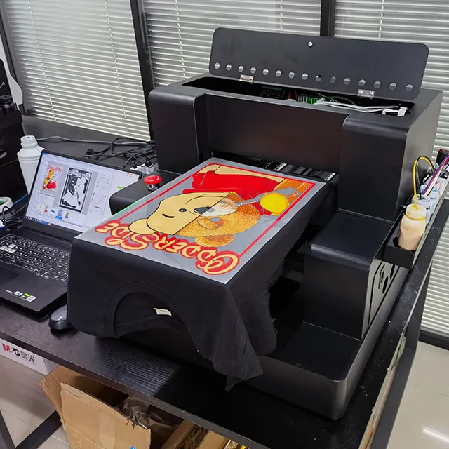 गर्म बिक्री कपड़े टी शर्ट मुद्रण मशीन XP600 प्रिंटर सिर A3 DTG प्रिंटर
