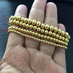 Piccolo 3mm 4mm 6mm gioielli da donna in acciaio inossidabile fatti a mano regolabili in <span class=keywords><strong>argento</strong></span> con perline a sfera in oro braccialetto elastico con perline in oro - Product Image 1