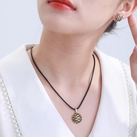 Ensemble de bijoux texturés ronds rétro XUPING, collier en cordon de cuir noir et boucles d'oreilles clous, ensemble 2 pièces pour femme, usage quotidien, vente en gros