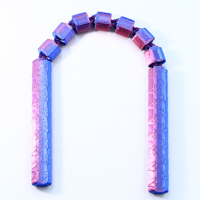 Nunchaku rouge et bleu 28 cm