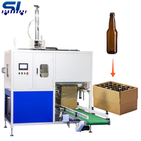 Machine d'emballage automatique pour bouteilles et cartons, pour bouteilles d'eau minérale PET vides