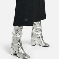 Chaussures de styliste à bout rond pour femmes, bottes hautes de luxe, de marque, avec talon épais métallique et argent