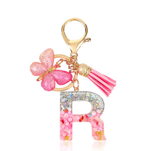 Llavero al por mayor con borla rosa, mariposa, copo de nieve de resina y letra inicial, para bolso, mochila, cartera, llavero con letra del alfabeto - Product Image 5