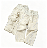 Jean pour homme personnalisé OEM Rock Revival, coupe droite, taille haute double, délavé vintage, effet usé, orné de strass en forme de diamant, en denim évasé