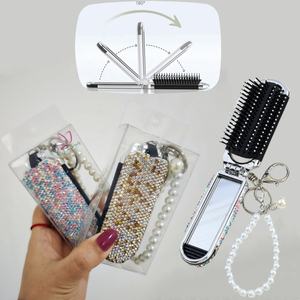 Groothandel 2 In 1 Haar Massage Kam Met Spiegel Strass Haarborstel Draagbare Opvouwbare Haarborstel Met Spiegel - Product Image 1