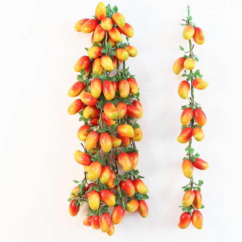 red mango skewer with leaves-red