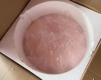 Table ronde en Onyx rustique, couleur marbre, avec fond de couleur rose, Table basse, à côté, Onix translucide