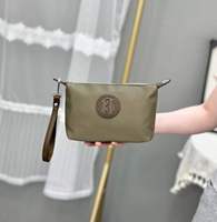 Pochette portable imperméable en tissu Oxford pour femme, motif géométrique brodé, logo orné, fermeture éclair, idéale pour les trajets quotidiens