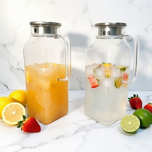 Grande carafe en verre résistant à <span class=keywords><strong>la</strong></span> chaleur avec poignée et couvercle, idéale pour le thé glacé, le café et les boissons froides ou chaudes, à conserver dans le réfrigérateur. - Product Image 2