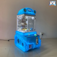 En gros Mini machine à griffes d'arcade style char à chenilles, distributeur de pièces de monnaie pour peluches et bonbons