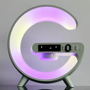 Altavoces pequeños inalámbricos inteligentes con Bluetooth OEM con cargador inalámbrico en forma de G Lámpara LED Despertador con luz de despertador