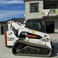 Chargeuse sur chenilles Bobcat T770 d'occasion, 1576 kg, avec levage vertical, moteur 92 CV, godet de 0,55 m³, pour travaux de construction et d'aménagement paysager