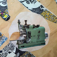 MG-30 Machine à coudre surjeteuse industrielle Merrow en promotion pour les écussons et badges des uniformes scolaires