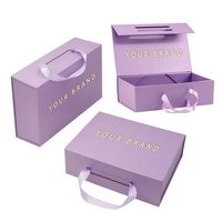 Boîte cadeau magnétique violette personnalisée avec poignée en ruban, emballage rigide pliable en papier pour perruques et vêtements, logo de luxe en feuille d'or