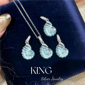 Juego de Collar y Pendientes de Plata de Ley S925 con Concha Marina y Cristal Azul de King Silver Jewelry, Joyería de Moda para Fiestas - Product Image 1