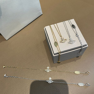 Collar con colgante pequeño de Saturno y copo de nieve hueco con diamantes completos, estilo Imperatriz Viuda, para mujer, cadena de bambú de plata 925, apilable, deportivo, para uso diario - Product Image 4