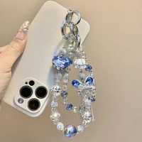Breloque de téléphone papillon bleu en strass et perles, pendentif de sac artisanal lourd, cordon de poignet, cadeau bijou pour femme