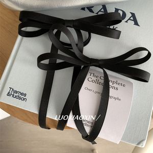 High-end black <b>bow</b> hair <b>clip</b>, Korean style, simple and versatile hair accessory, elegant and minimalist. - Product Image 2