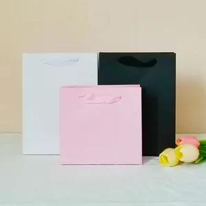 Sacs d'emballage en papier de luxe sac en papier d'art imprimé personnalisé poignées de ruban sac en papier de luxe