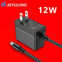 Adaptateur secteur universel mural 12V1A AC/DC avec matériau PC et connexion enfichable pour bandes lumineuses LED
