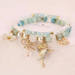 Neues Trendiges Tanzendes Mädchen Kristallarmband Elastisches Seil Kristallperlen Armreif Süße Schleife Blume Ballerina-Anhänger Charm-Armband - Product Image 6