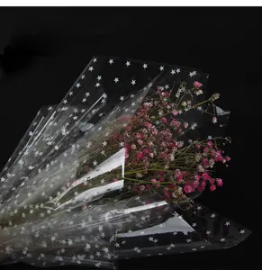 Papel de embalaje de flores, envoltura de celofán transparente impermeable, regalo, patrón de estrellas blancas para ramo de flores, venta al por mayor