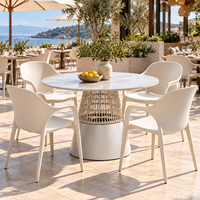 Table de salle à manger ronde moderne d'extérieur avec piétement en métal et design en corde tressée pour patio, jardin, café, restaurant, hôtel, terrasse