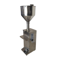 Machine de remplissage semi-automatique verticale à piston pour sauces, crèmes, confitures, lotions, shampoings, boissons, gels en bouteilles et sachets