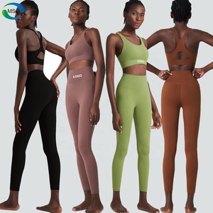 Completo Sportivo da Donna in Tessuto Liscio Nylon Spandex con Reggiseno Sportivo Incrociato sulla Schiena e Leggings a Vita Alta per Palestra e Yoga - Product Image 1