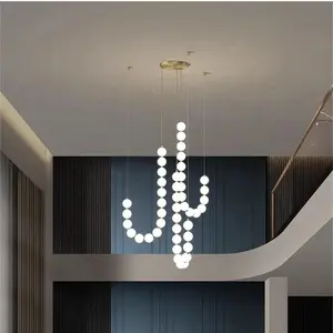 Lampadario lungo scala Nordic Duplex moderno semplice ristorante creativo Villa bianco sfera di vetro lampade a sospensione