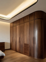Armoire intégrée moderne en bois foncé avec portes courbées, placard d'angle sur mesure, armoire de chambre à coucher en bois massif