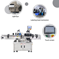 Machine d'étiquetage de bouteilles rondes à commande PLC, précision ±0,5 mm pour l'étiquetage des bouteilles d'huiles essentielles et cosmétiques