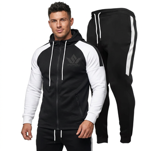 Ensemble de survêtement unisexe SPARKWELL INDUSTRY noir et blanc coupe-vent 100 % coton avec sweat à capuche zippé et pantalon de jogging color block décontracté - Product Image 1