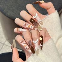 Ongles press-on faits main de haute qualité, super longs, rose-brun, effet œil de chat, pour un style jeune et féminin