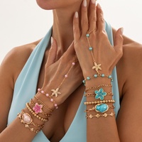 Lot de 6 bracelets chaîne de main bohèmes étoile de mer et fleur de coquillage pour femme, style vintage, accessoires de vacances empilables