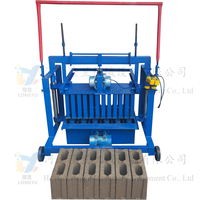 Petite machine portable de fabrication de briques creuses pour usage domestique, très demandée au Nigeria