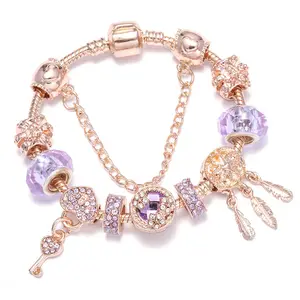 9款批发顶级销售镂空金色紫色水晶珠镀金饰品手镯羽毛钥匙吊坠女性派对饰品