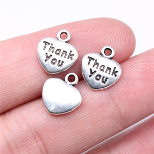 Gangan 13x11mm 0.9g ciondolo in argento antico con cuore e pesca, grazie - Product Image 1