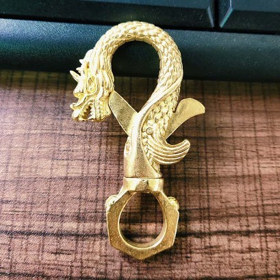 Porte-clés tête de dragon doré