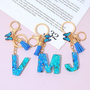 Colgante de borla con letras de la A a la Z en epoxi degradado azul y mariposa, un souvenir muy vendido para <span class=keywords><strong>bolsos</strong></span> de mujer. - Product Image 4