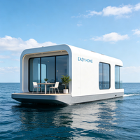 Maison flottante compacte de 20 pieds, cabine modulaire préfabriquée pour maison de vacances sur lac ou rivière