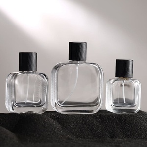 Bouteille de parfum en verre plat avec emballage en boîte - Product Image 1