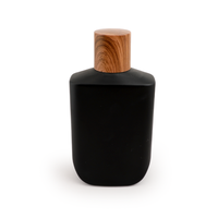 Flacon de parfum rectangulaire arrondi noir mat de 100 ml avec bouchon en bois, vide et rechargeable, vente en gros directe d'usine