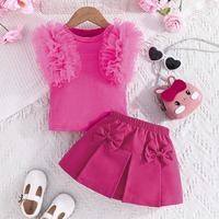 Annshine Wholesale 2026 Ensemble haut à manches en maille couleur unie et jupe à nœud pour filles, best-seller
