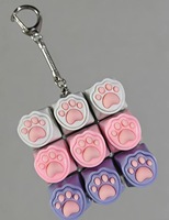 Porte-clés anti-stress patte de chat à 9 touches, jouet sensoriel lumineux à pression, gadget mignon pour soulager l'anxiété pour enfants et adultes