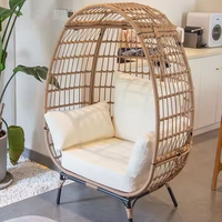 Échantillon gratuit Chaise balançoire en osier suspendue en forme d'oeuf pour l'intérieur moderne Meubles de jardin en rotin en métal Balançoire extérieure pour le patio