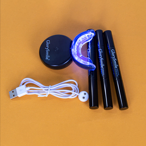 Nuevo blanqueamiento de dientes recargable inalámbrico sin peróxido rojo azul Ray LED luz inalámbrica Kit de blanqueamiento de dientes