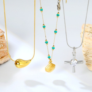 สร้อยคอไม้กางเขนสแตนเลสสตีลประดับเซอร์คอนสไตล์มินิมอลแบบยุโรปอเมริกัน พร้อมจี้รูปหยดน้ำเปลือกหอยสีทองสำหรับผู้หญิง - Product Image 1