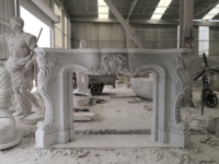 Cheminée électrique en marbre blanc naturel sculpté à la main, cadre de cheminée de luxe moderne en pierre avec sculptures florales complexes pour cuisine et hôtel
